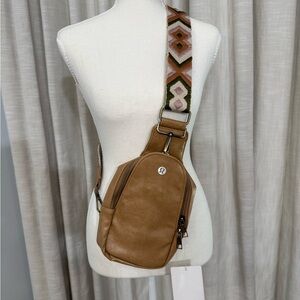 lululemon athletica Tan Leather Crossbody Sling with Patterned Strap